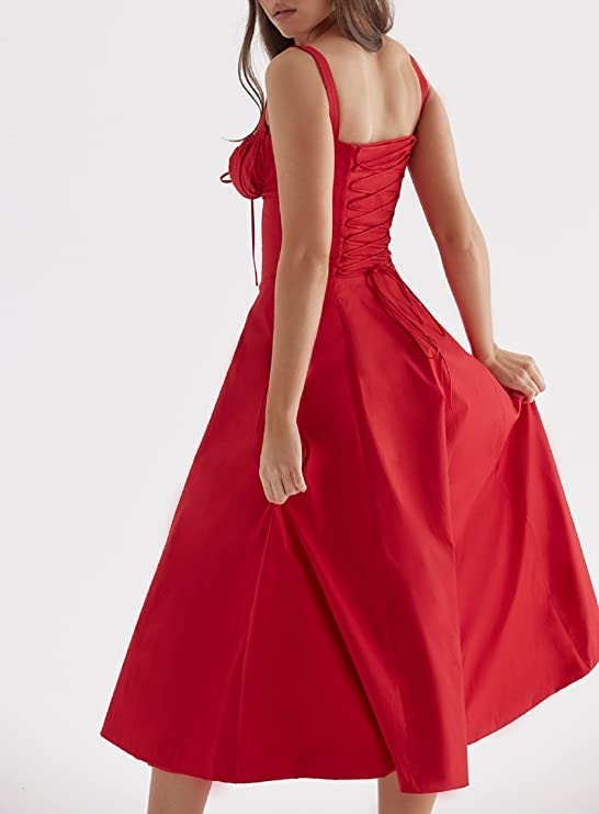 Red dress with a fitted bodice and flowing skirt on a white background