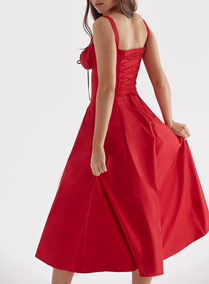 Red dress with a fitted bodice and flowing skirt on a white background