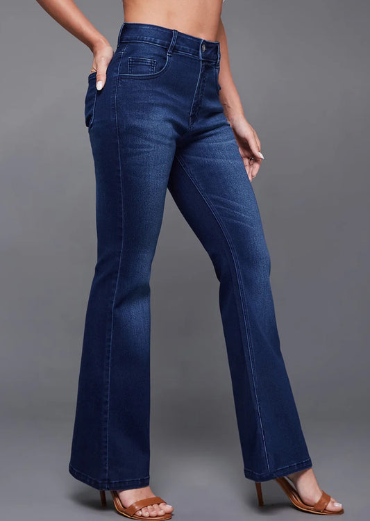 Blue jeans worn by a person on a gray background